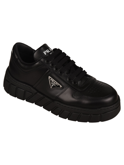 Shop Prada Logo Plaque Perforated Sneakers In Black
