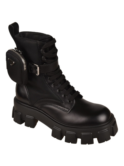 Shop Prada Strapped Pouch Combat Boots In Black