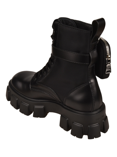 Shop Prada Strapped Pouch Combat Boots In Black