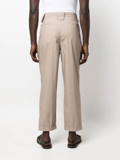 Shop Nanushka High-rise Pleated Trousers In Neutrals