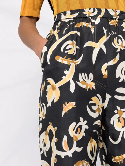 Nanushka Graphic Floral-print Elasticated-waist Trousers In Black