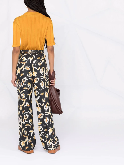 Nanushka Graphic Floral-print Elasticated-waist Trousers In Black