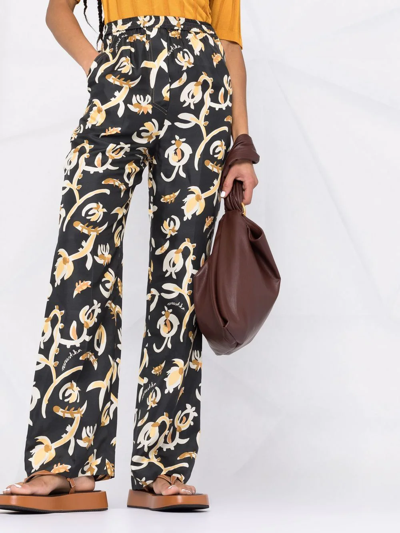 Nanushka Graphic Floral-print Elasticated-waist Trousers In Black