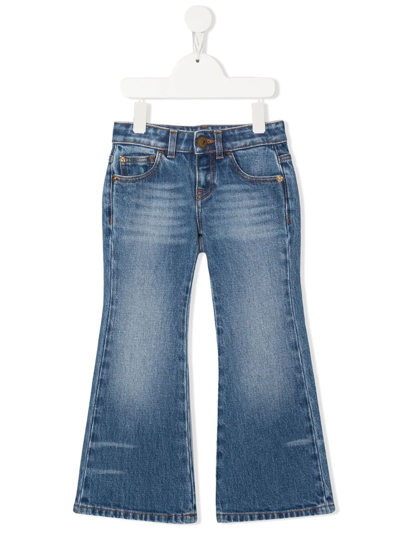 Shop Versace Flared Leg Jeans In Blue