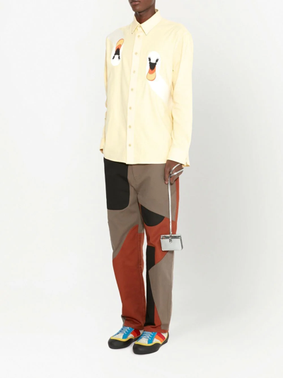 Shop Jw Anderson Patchwork Cotton Trousers In Brown