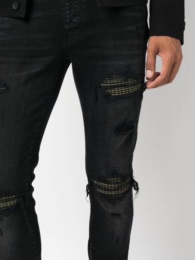 Shop Amiri Ripped Skinny-cut Jeans In Black