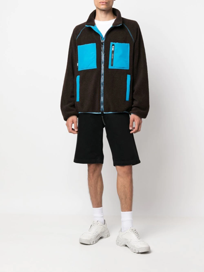 Msgm Logo High Neck Jacket With Contrast Pockets In Brown