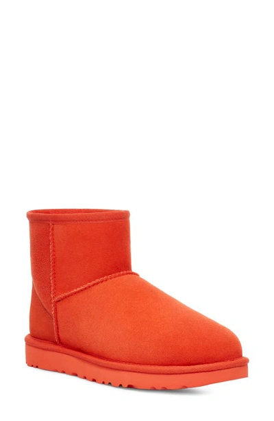 Shop Ugg Classic Mini Ii Genuine Shearling Lined Boot In Hazard Orange