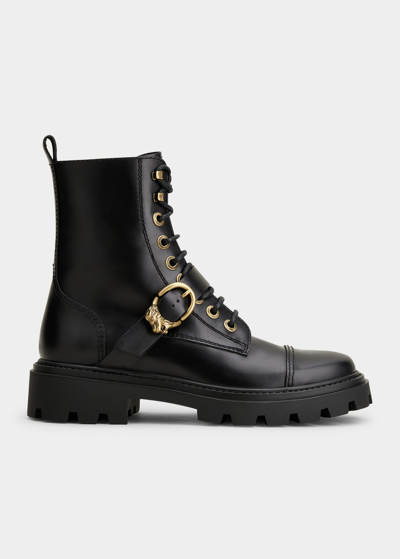 Shop Tod's Lionshead Buckle Leather Combat Boots In Black