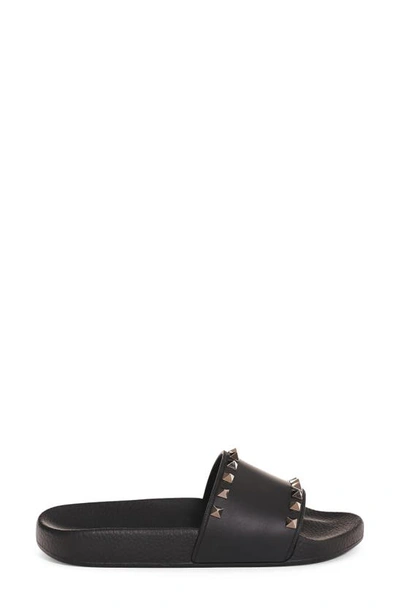 Shop Valentino Rockstud Slide Sandal In Black/ Black