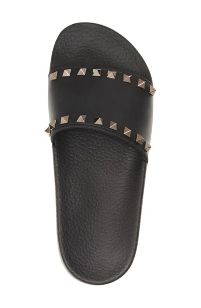 Shop Valentino Rockstud Slide Sandal In Black/ Black