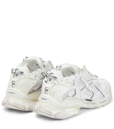 Shop Balenciaga Runner Sneakers In White