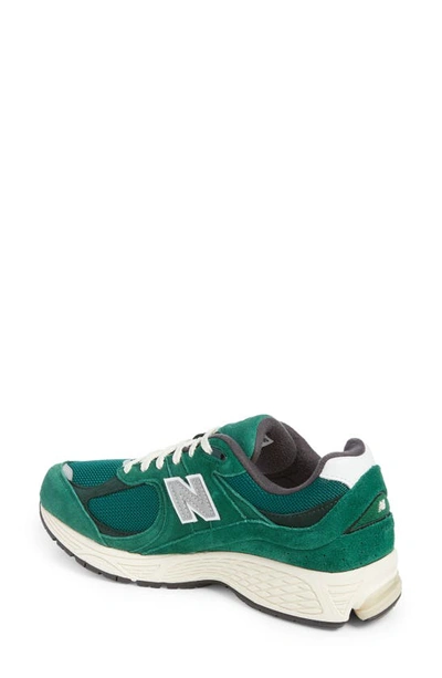 Shop New Balance 2002r Sneaker In Nightwatch Green