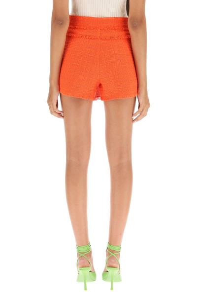 Shop Msgm Tweed Skort In Orange