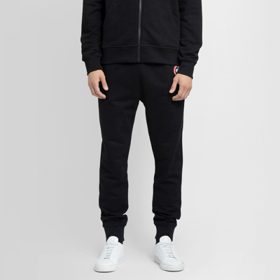 Shop Canada Goose Trousers In Black