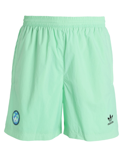 neon green adidas shorts