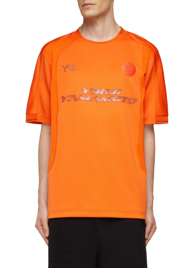 Shop Y-3 Yohji Football Logo Print Crewneck Short Sleeve T-shirt In Orange
