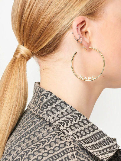 Shop Marc Jacobs Oversized Logo Hoop Earrings In Gold