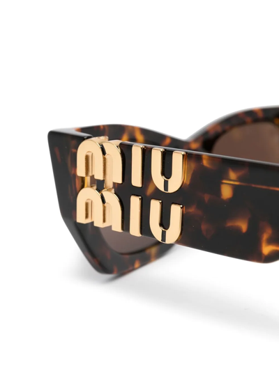 Shop Miu Miu Logo-plaque Oversize-frame Sunglasses In Braun