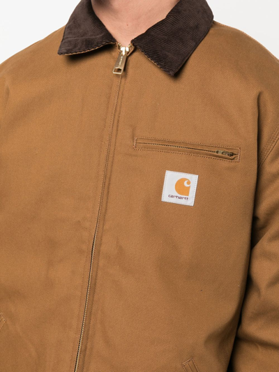 Shop Carhartt Logo-patch Front-zip Jacket In Braun