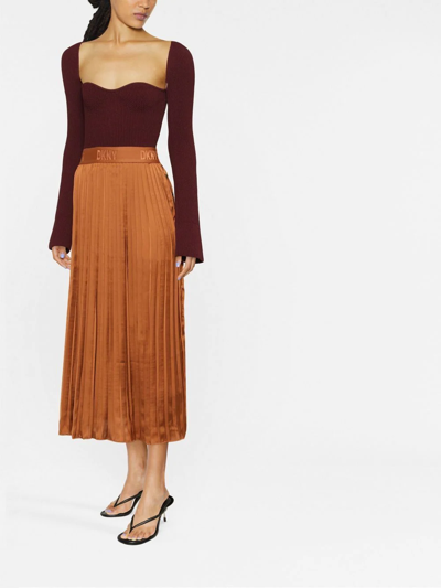 Shop Dkny Logo-waistband Pleated Midi-skirt In Braun