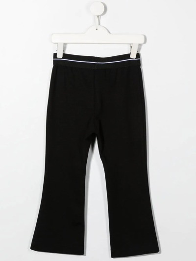 Msgm Logo-waist Flared Jersey Trousers In Blue
