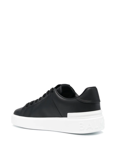 Shop Balmain Leather Low-top Sneakers In Black