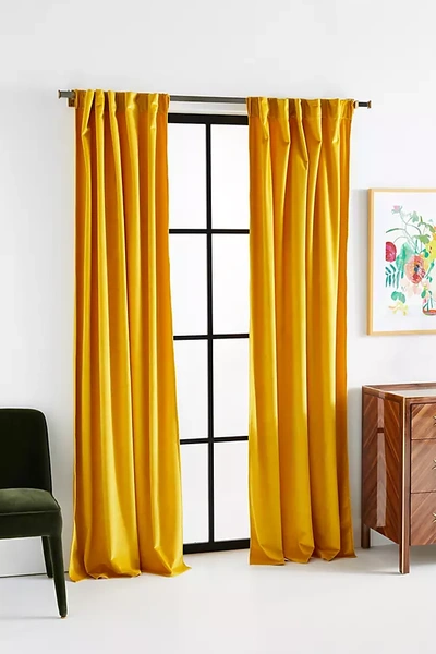 Shop Anthropologie Velvet Louise Curtain By  In Yellow Size 50x84