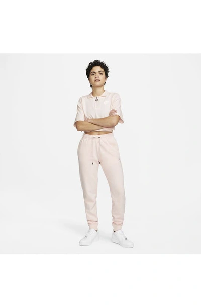 Shop Nike Sportswear Essential Fleece Pants In Atmosphere/ White