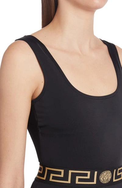 Shop Versace La Greca Waistband One-piece Swimsuit In Black