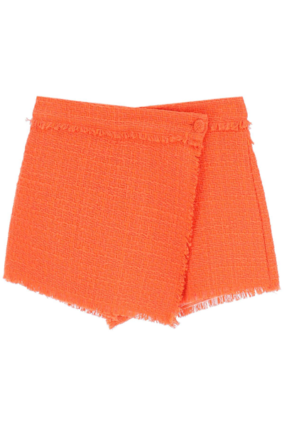 Shop Msgm Tweed Skort In Orange
