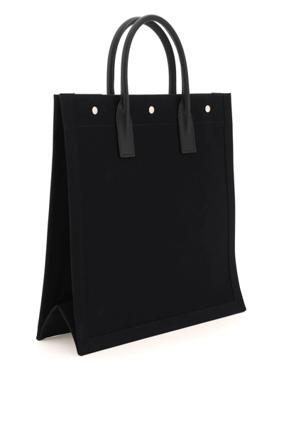 Shop Saint Laurent Rive Gauche N/s Canvas Tote Bag In Black