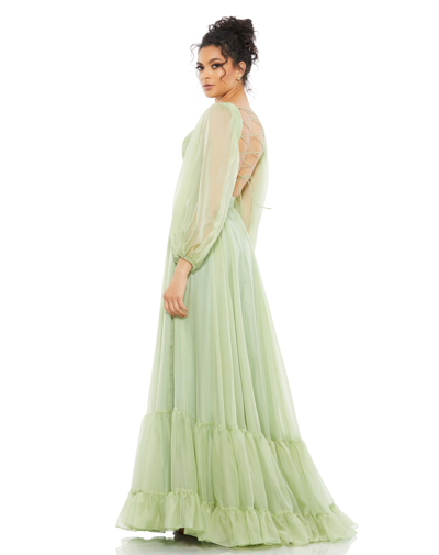 Shop Mac Duggal Pleated Cut Out Long Sleeve Lace Up Tiered Gown In Sage