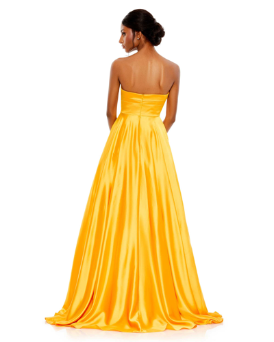 Shop Mac Duggal Bow Sweetheart Strapless A Line Gown In Marigold