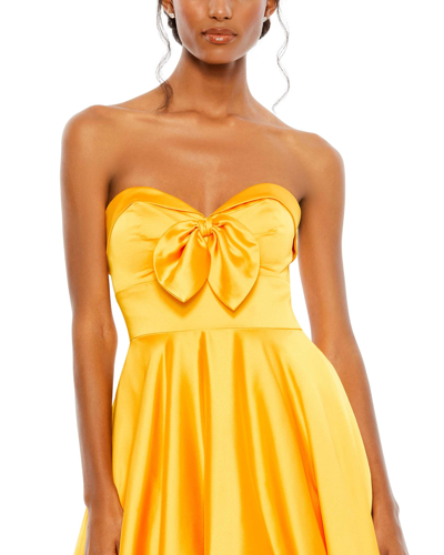 Shop Mac Duggal Bow Sweetheart Strapless A Line Gown In Marigold