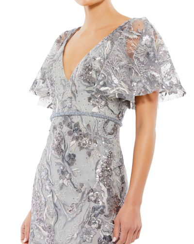 Shop Mac Duggal Embellished V Neck Butterfly Sleeve Trumpet Gown In Platinum