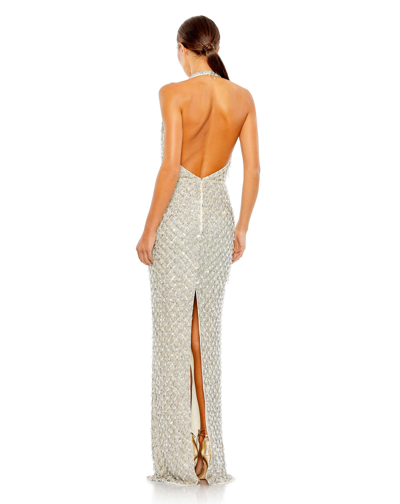 Shop Mac Duggal Sequined Crystal Fringe Halter Strap Gown In Nude Silver