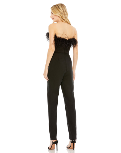 Shop Ieena For Mac Duggal Strapless Jumpsuit With Feather Trim In Black