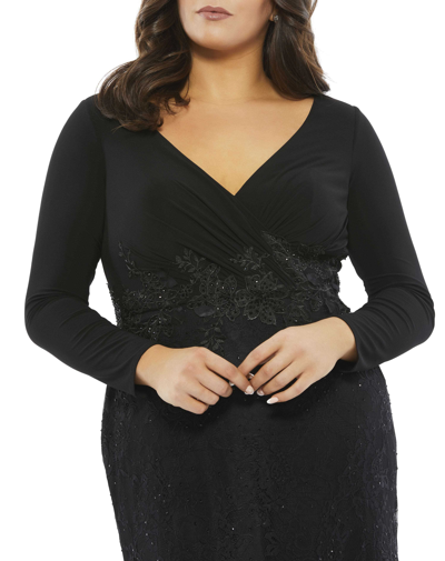 Shop Mac Duggal Wrap-over Long Sleeve Lace Applique Trumpet Gown (plus) In Black