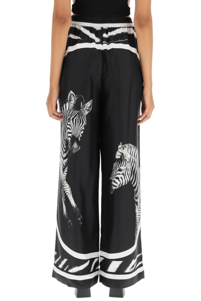 Shop Dolce & Gabbana Zebra Print Silk Pajama Pants In Black