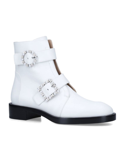 Shop Stuart Weitzman Embellished-buckle Ryder Boots 25 In White