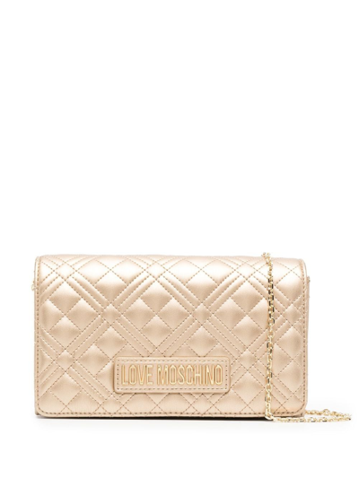 Shop Love Moschino Quilted-finish Crossbody Bag In Gelb