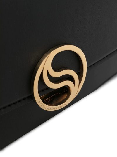 Stella Mccartney S-wave Logo Plaque Fold-over Shoulder Bag In Black