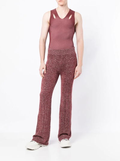 Shop Dion Lee Marl-knit Ribbed Flared Trousers In Red