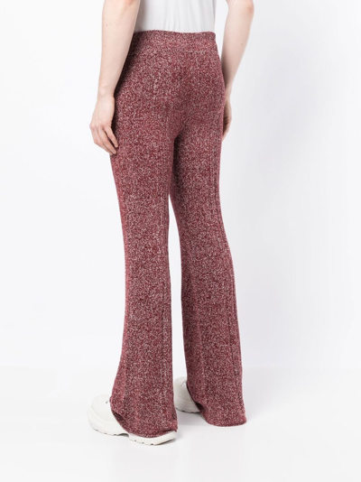 Shop Dion Lee Marl-knit Ribbed Flared Trousers In Red
