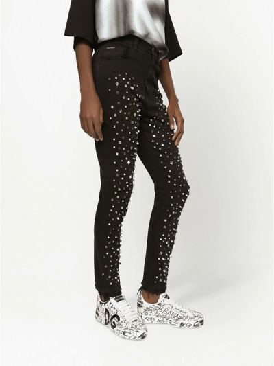 Shop Dolce & Gabbana Audrey Studded Skinny Jeans In Schwarz