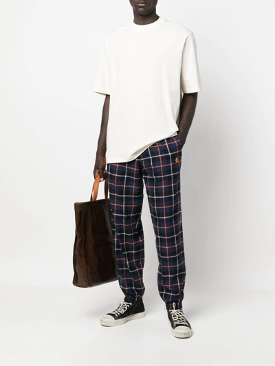 Shop Marcelo Burlon County Of Milan Check-print Trousers In Blau