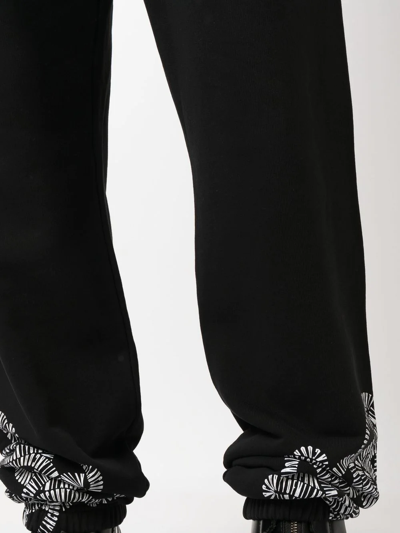 Shop Marcelo Burlon County Of Milan Logo-print Tapered Sweatpants In Black