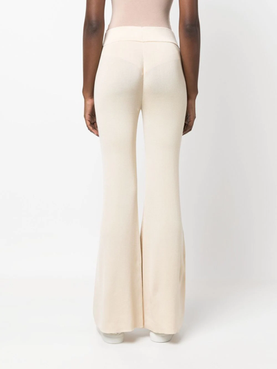 Shop St Agni Flared Knitted Pants In Neutrals