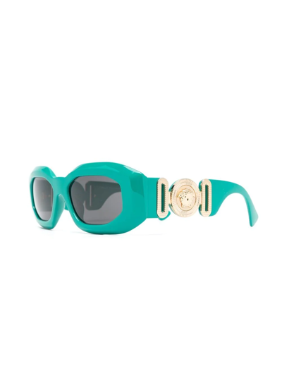 Shop Versace Medusa Head-detail Oval-frame Sunglasses In Green